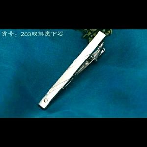 Men's silver tie pin with button hook